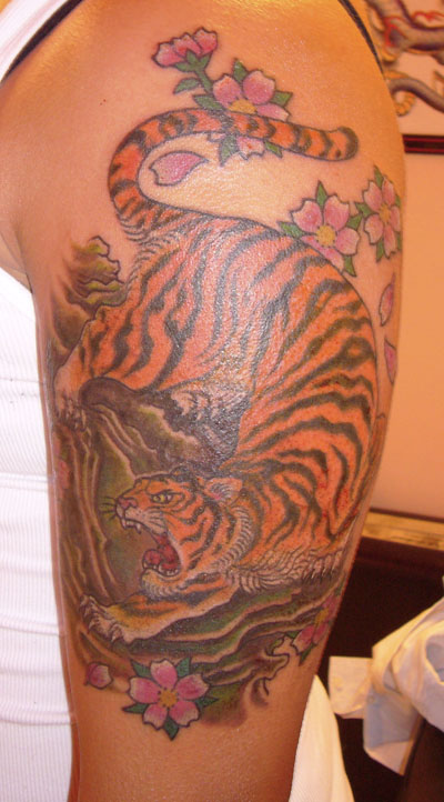 orange tiger and pink cherry blossoms tattoo by Jennifer Overbury